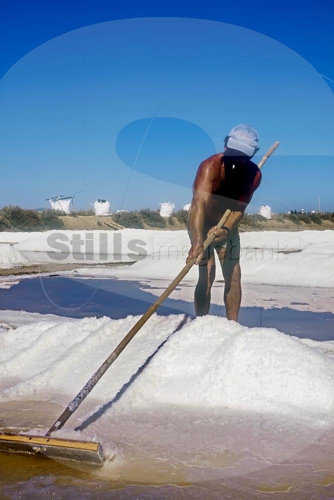 Man working in handmade salt collection