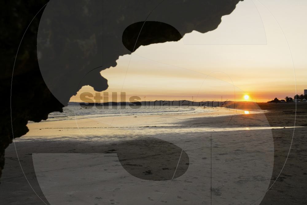 Sunset at Alvor next to a rock