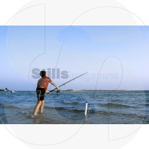 Boy fishing at Ria Formosa