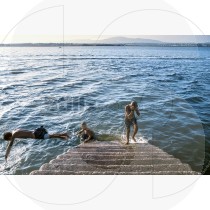 Kids diving from the stairs at Ria Formosa