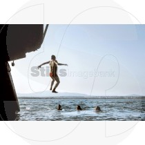 Kid jumps to the water at Ria Formosa (RM)