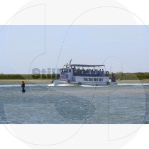 Boat and fisherman in Ria Formosa