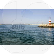 View of ria next to the pier wall of Fuseta at Ria Formosa