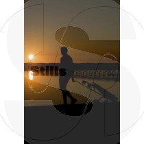 Golf player at sunset